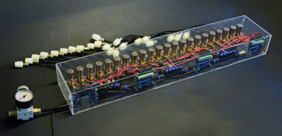 Figure 2 — A bank of solenoid valves mounted on a pipe-organ chest — each coil opens the wind path to one pipe on note-on