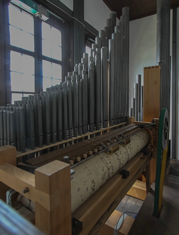 Figure 3 — The Salzburg Hornwerk ("Salzburger Stier") at Hohensalzburg Fortress, commissioned 1502; a pinned barrel-organ mechanism was added c. 1640, giving it a rotating repertory of stored tunes.